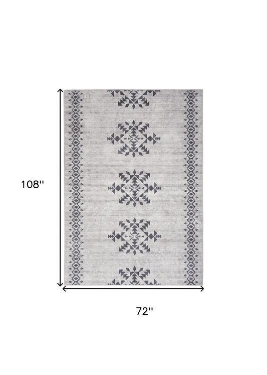 6' x 9' Gray and Ivory Geometric Power Loom Washable Area Rug