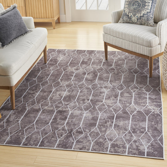5' x 7' Brown and Ivory Geometric Power Loom Washable Area Rug