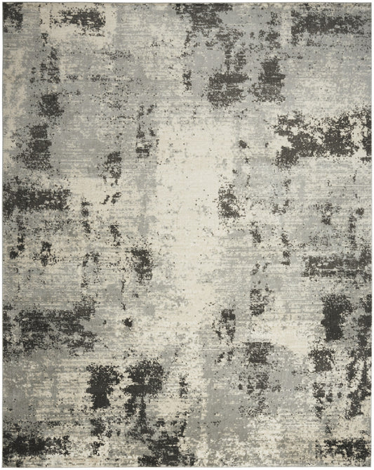 5' x 7' Cream Abstract Area Rug