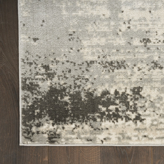 5' x 7' Cream Abstract Area Rug