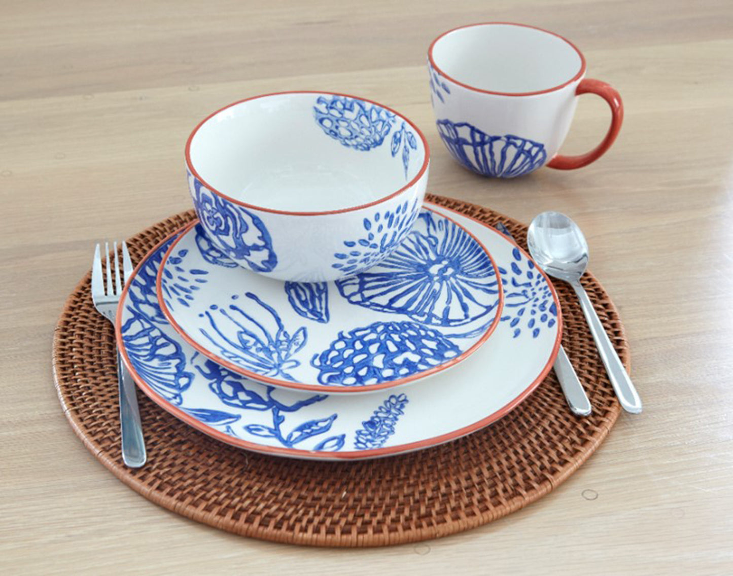 Blue and White Sixteen Piece Round Floral Ceramic Service For Four Dinnerware Set