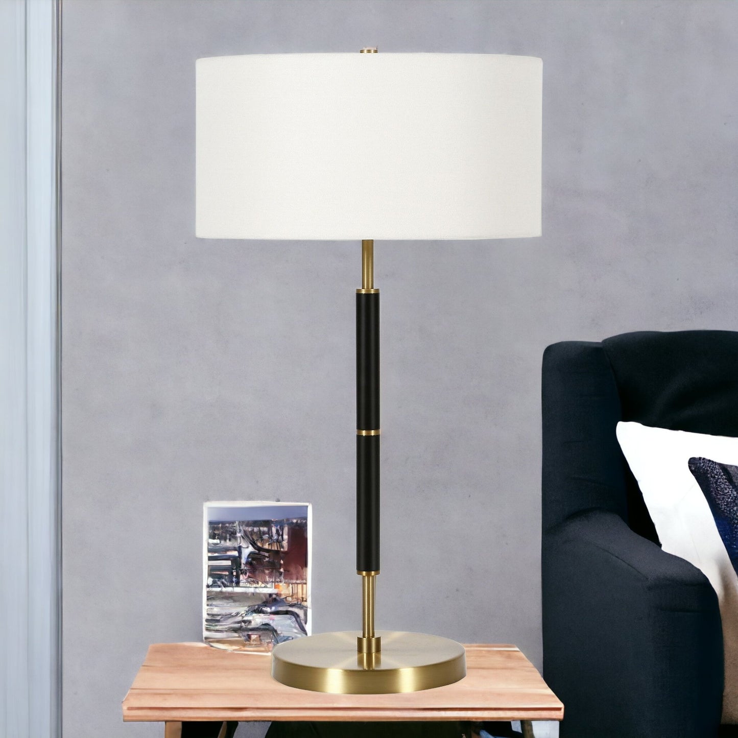 25" Black and Gold Metal Two Light Table Lamp With White Drum Shade