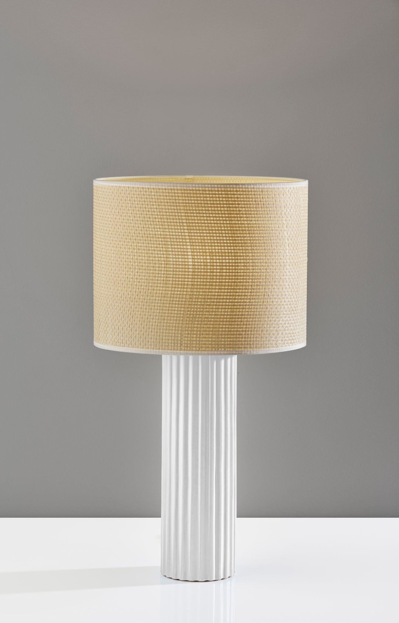 24" White Ceramic Cylinder Table Lamp With Beige Drum Shade