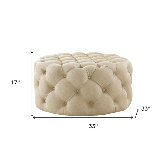 33" Beige Linen And Black Rolling Tufted Round Cocktail Ottoman