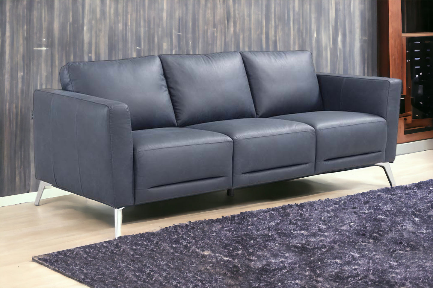 85" Blue Leather And Black Sofa