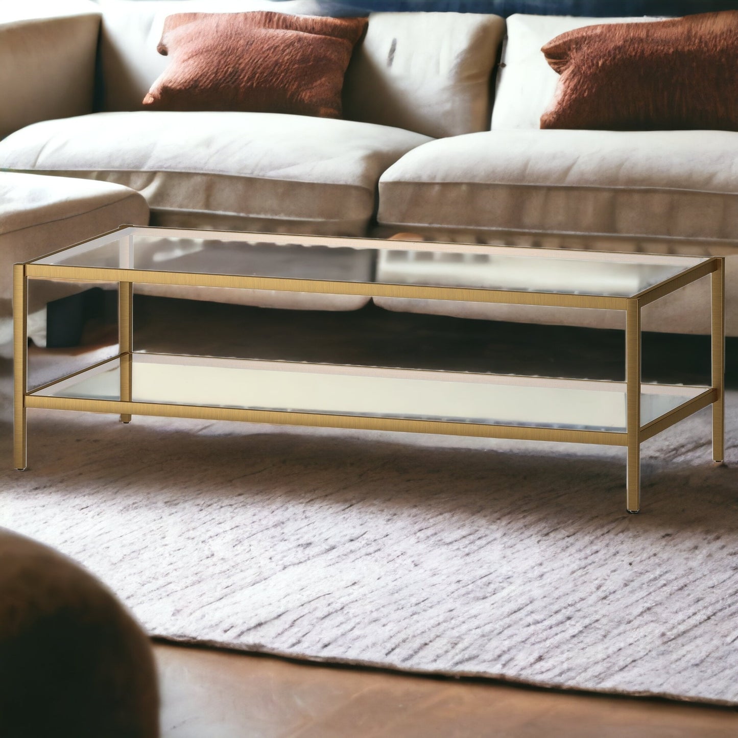 54" Clear And Gold Glass And Steel Coffee Table With Shelf