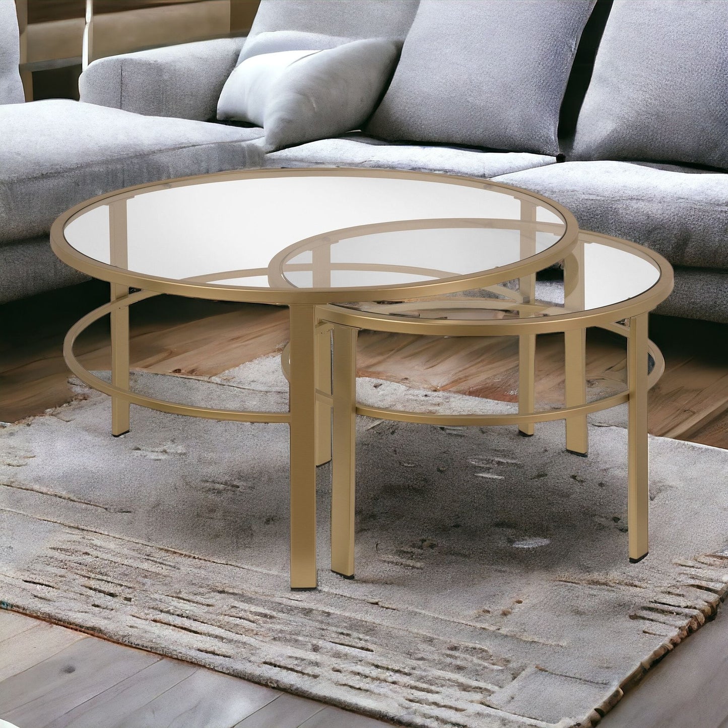 Set of Two 36" Gold Glass And Steel Round Nested Coffee Tables