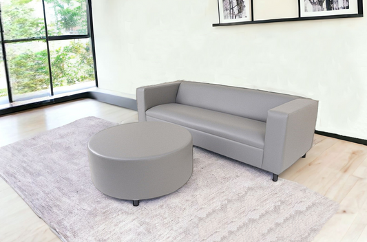 84" Gray Faux Leather And Black Sofa With Ottoman