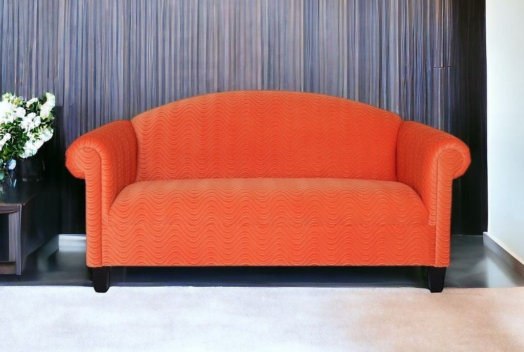 84" Orange Velvet And Black Sofa