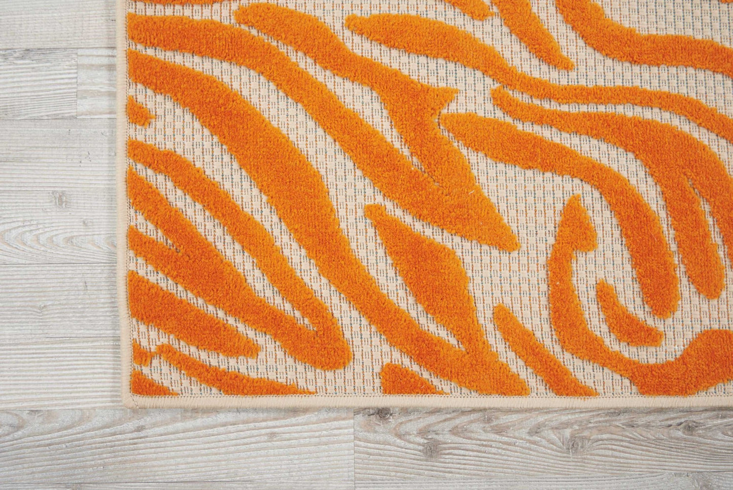 5’ X 8’ Orange Zebra Pattern Indoor Outdoor Area Rug