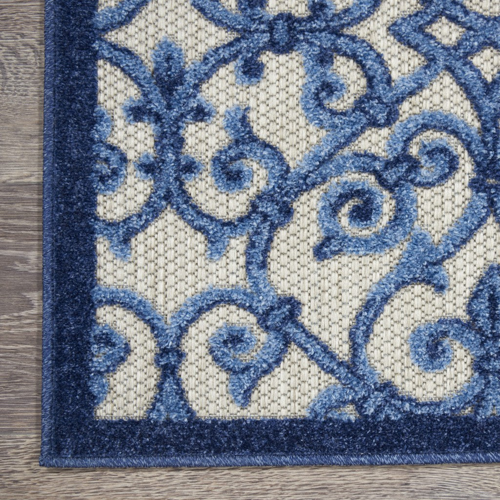 5' X 8' Blue And Gray Floral Indoor Outdoor Area Rug