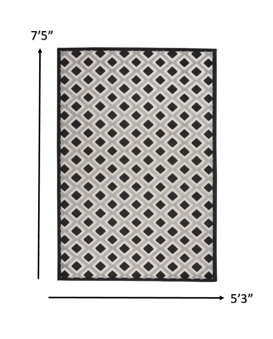 5' X 8' Black And White Geometric Indoor Outdoor Area Rug