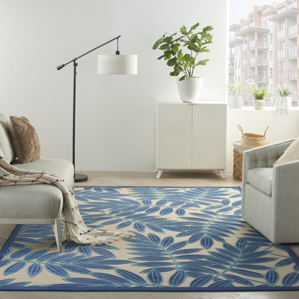 7' X 10' Blue And Ivory Floral Stain Resistant Indoor Outdoor Area Rug