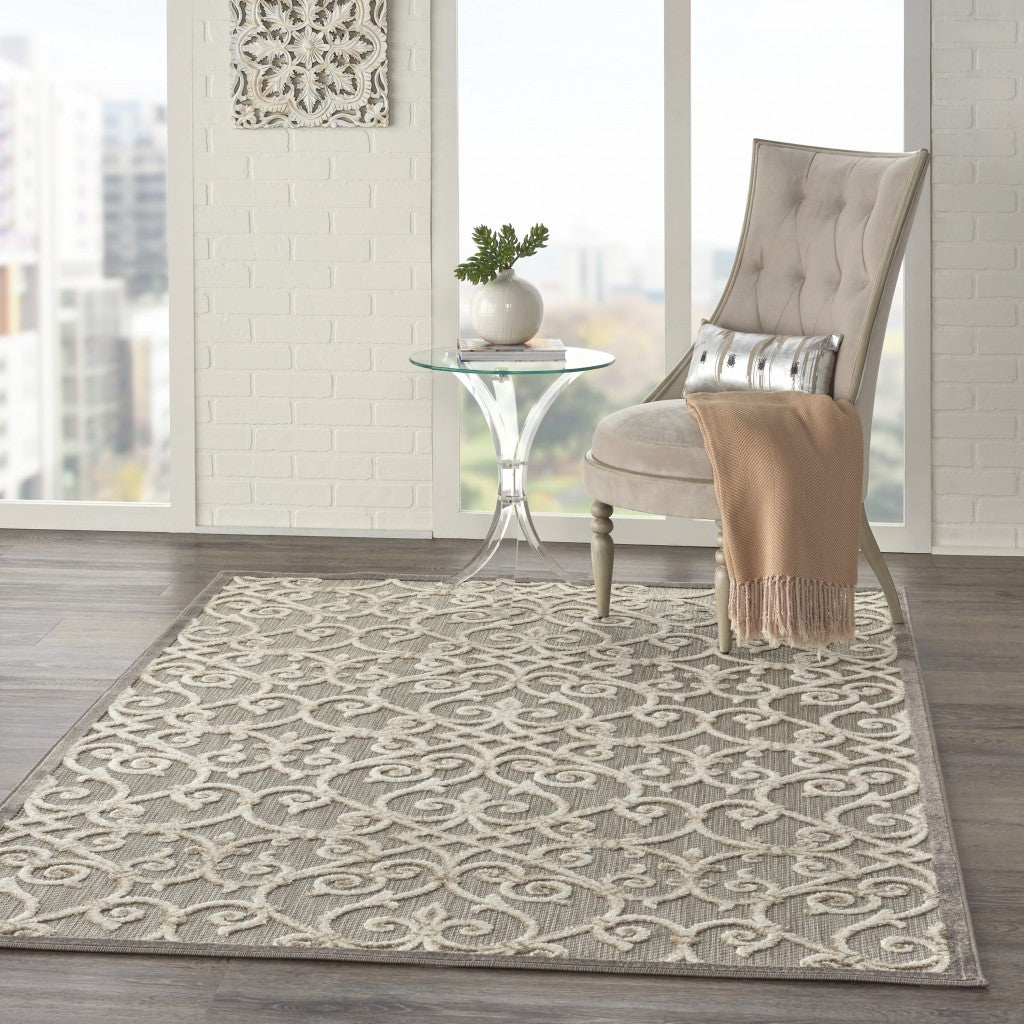 5' X 8' Gray And Ivory Floral Indoor Outdoor Area Rug