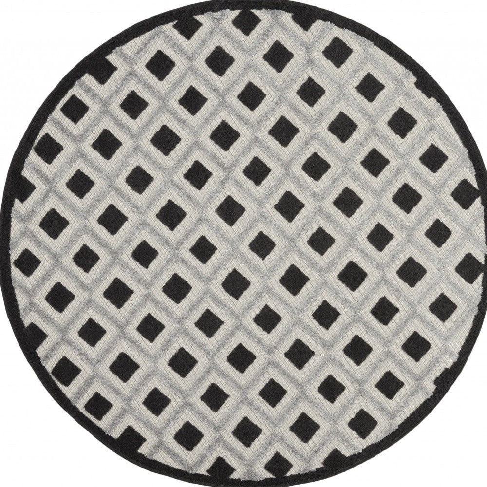 4' Round Black And White Round Geometric Indoor Outdoor Area Rug