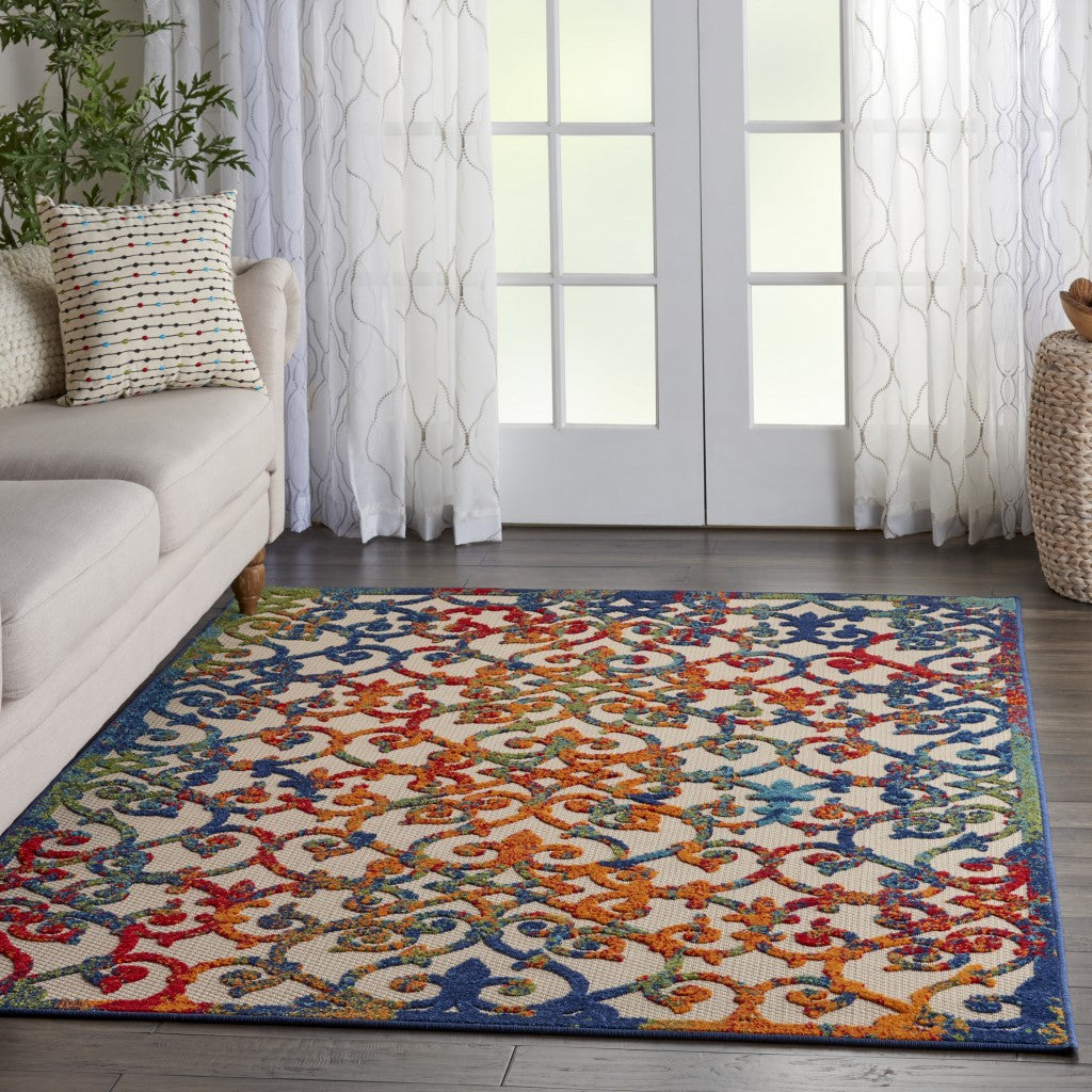 5' X 8' Ivory And Blue Floral Indoor Outdoor Area Rug