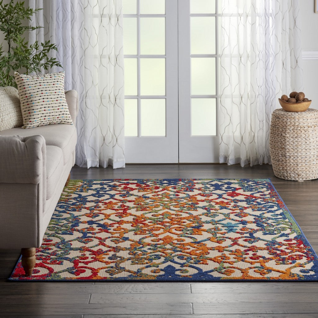 5' X 8' Ivory And Blue Floral Indoor Outdoor Area Rug