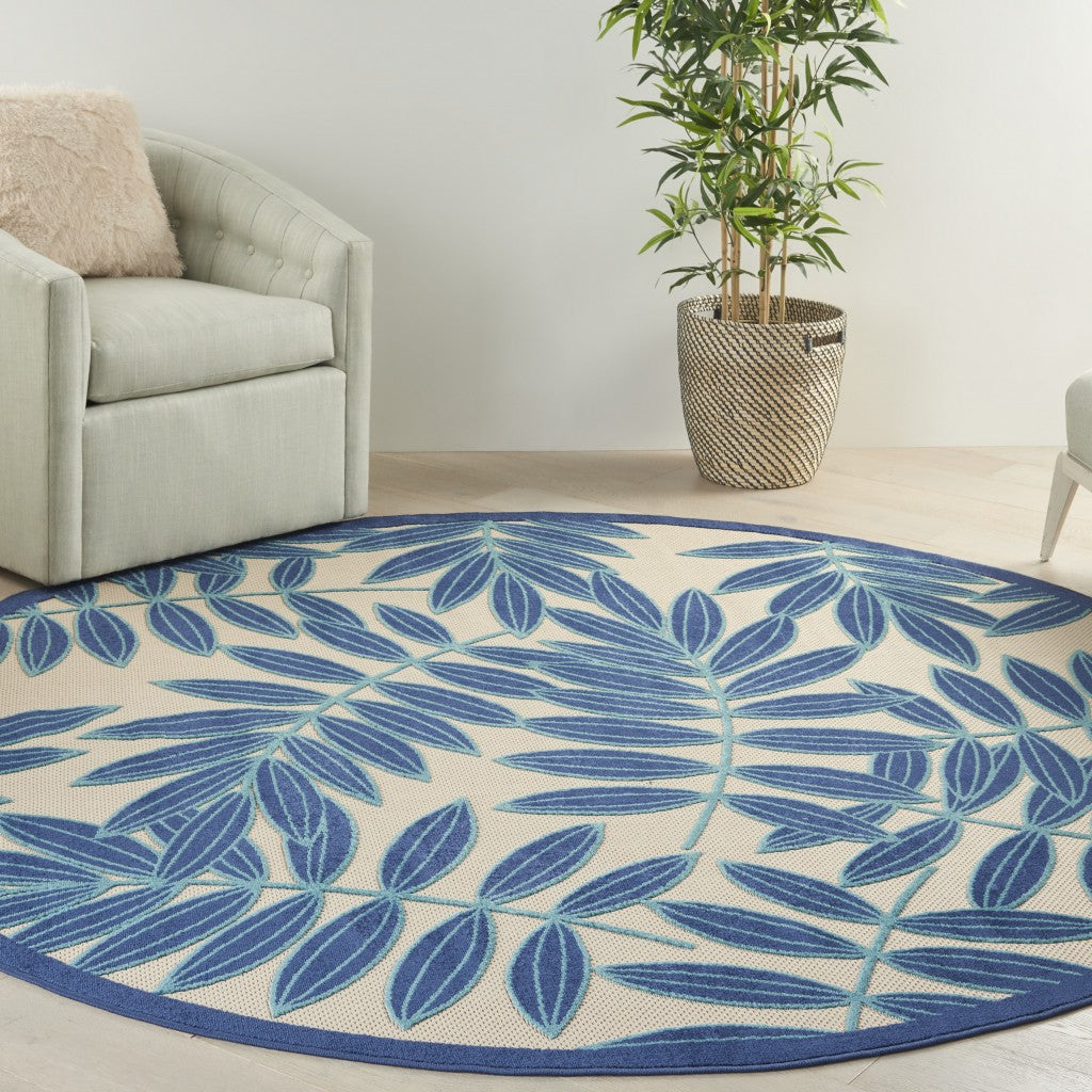 8' Round Blue And Ivory Round Floral Stain Resistant Indoor Outdoor Area Rug