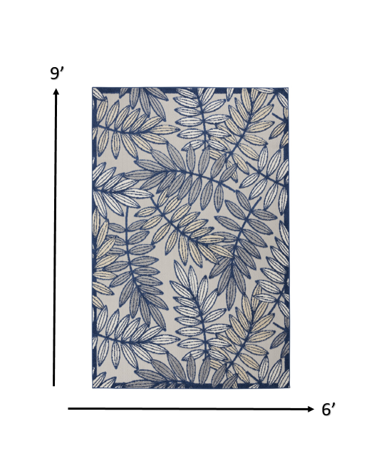 6' X 9' Ivory And Blue Floral Indoor Outdoor Area Rug