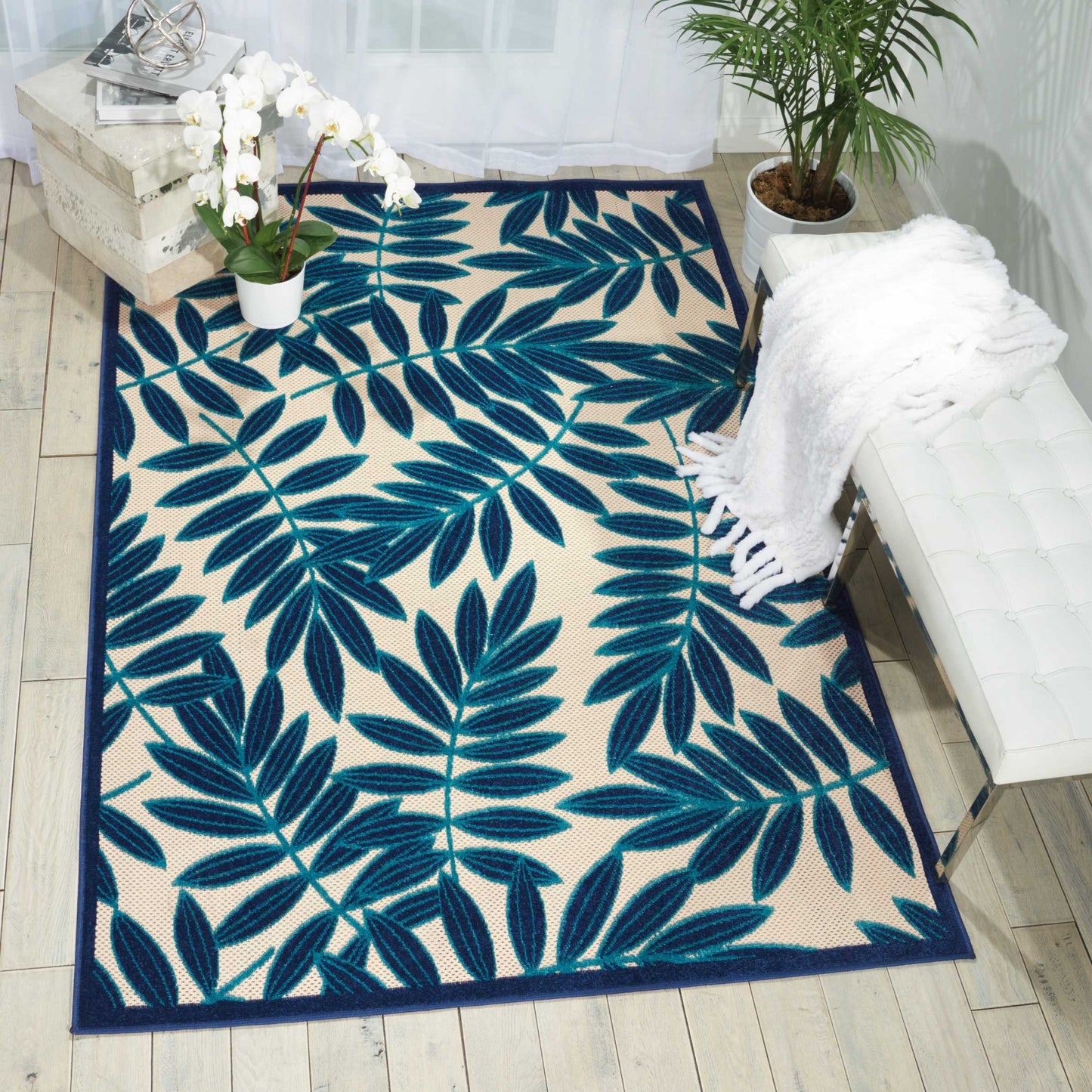 8' X 11' Blue And Ivory Floral Indoor Outdoor Area Rug