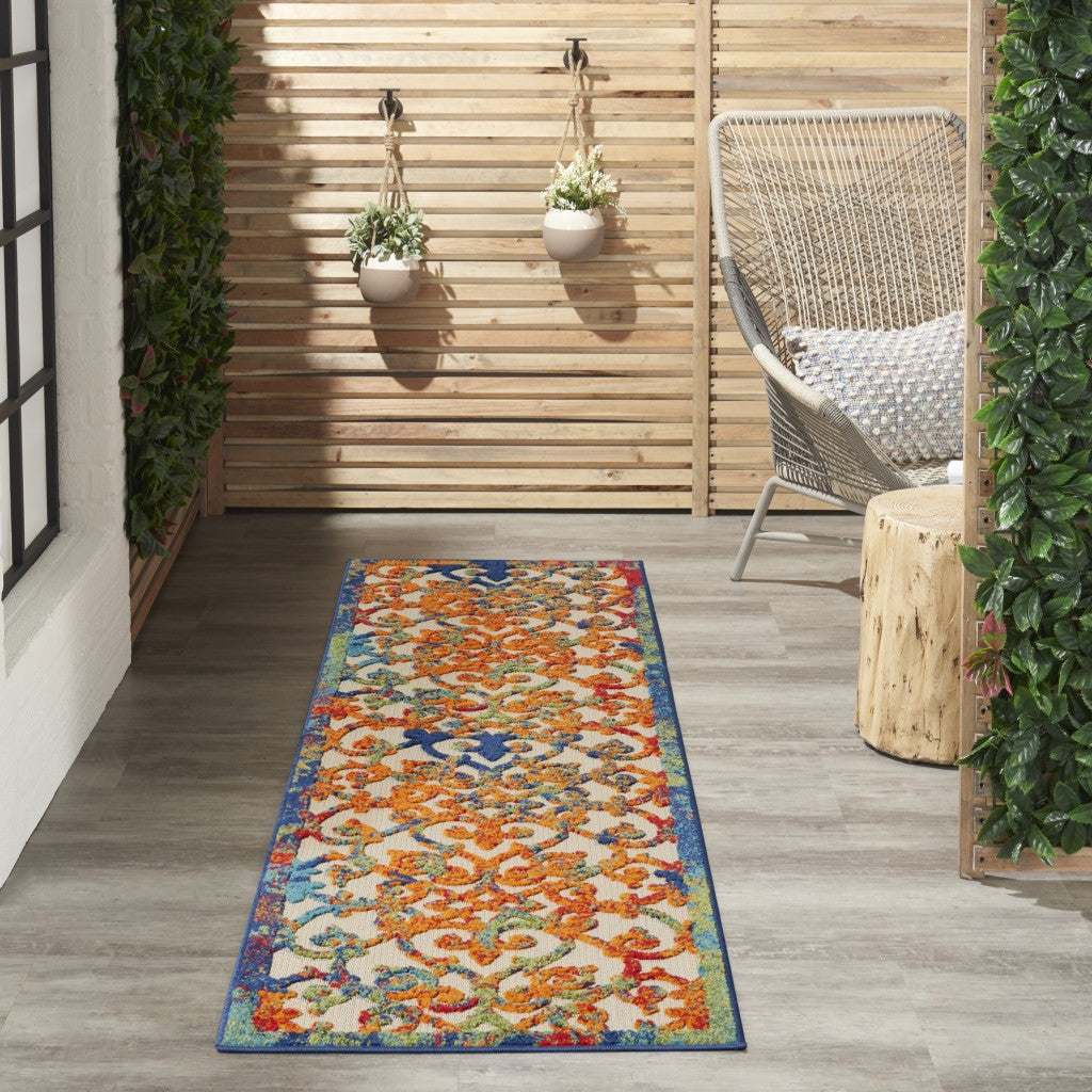 2' X 8' Ivory And Blue Floral Indoor Outdoor Area Rug