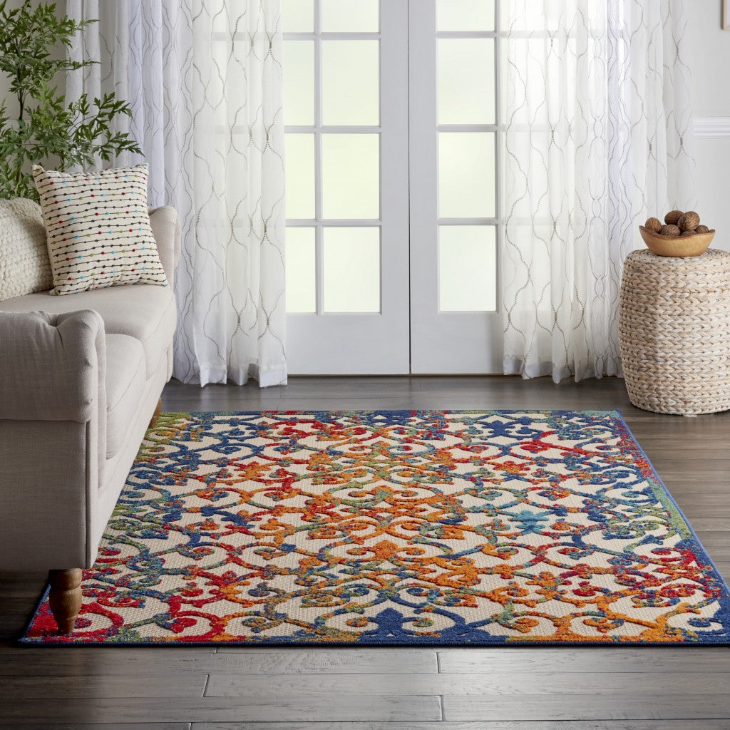 6' X 9' Ivory And Blue Floral Indoor Outdoor Area Rug