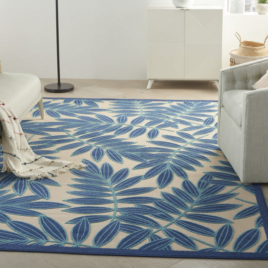 6' X 9' Blue And Ivory Floral Stain Resistant Indoor Outdoor Area Rug