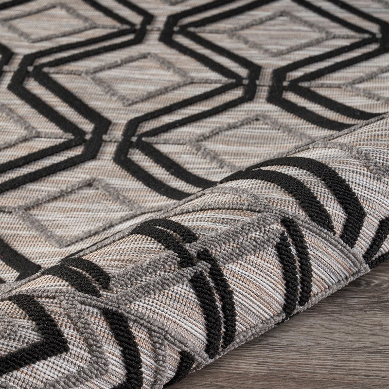 5' X 7' Black And Tan Indoor Outdoor Area Rug