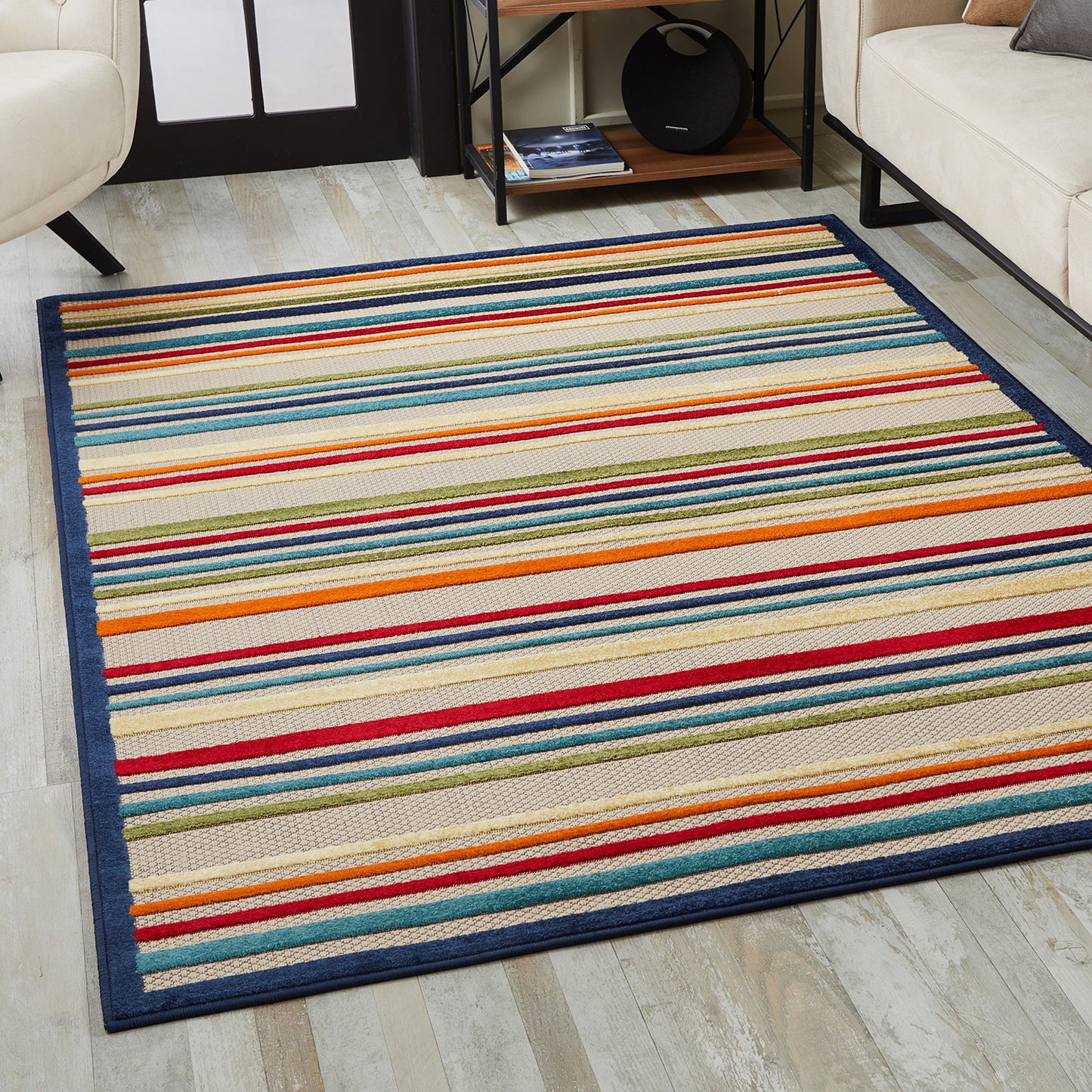 7' X 9' Ivory And Blue Striped Stain Resistant Indoor Outdoor Area Rug