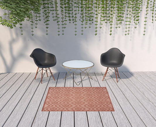 4' X 6' Coral Orange Argyle Indoor Outdoor Area Rug