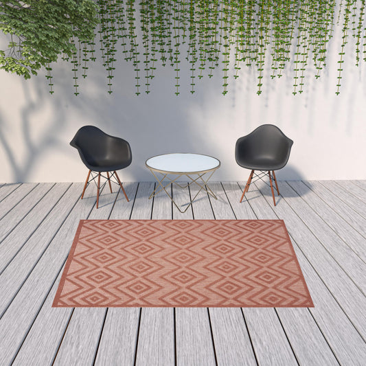 6' X 9' Coral Orange Argyle Indoor Outdoor Area Rug