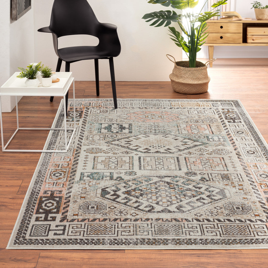 5' X 8' Cream Geometric Stain Resistant Indoor Outdoor Area Rug