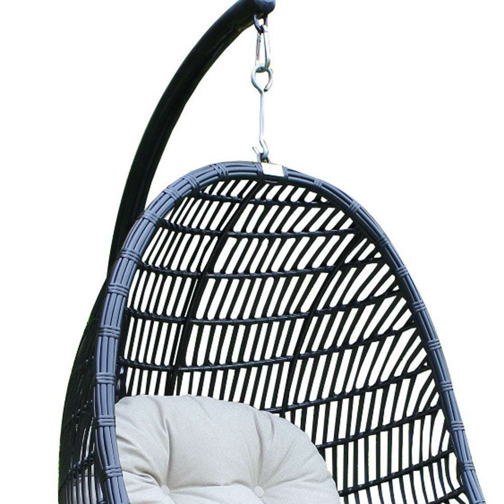 43" Beige And Black Metal Swing Chair With Beige Cushion