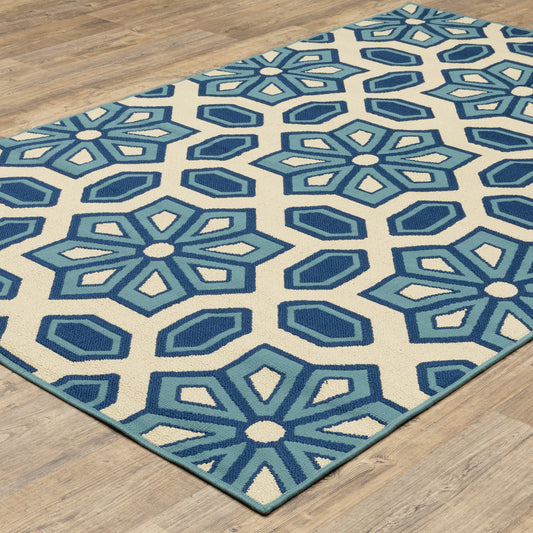 2' X 4' Ivory and Blue Geometric Stain Resistant Indoor Outdoor Area Rug