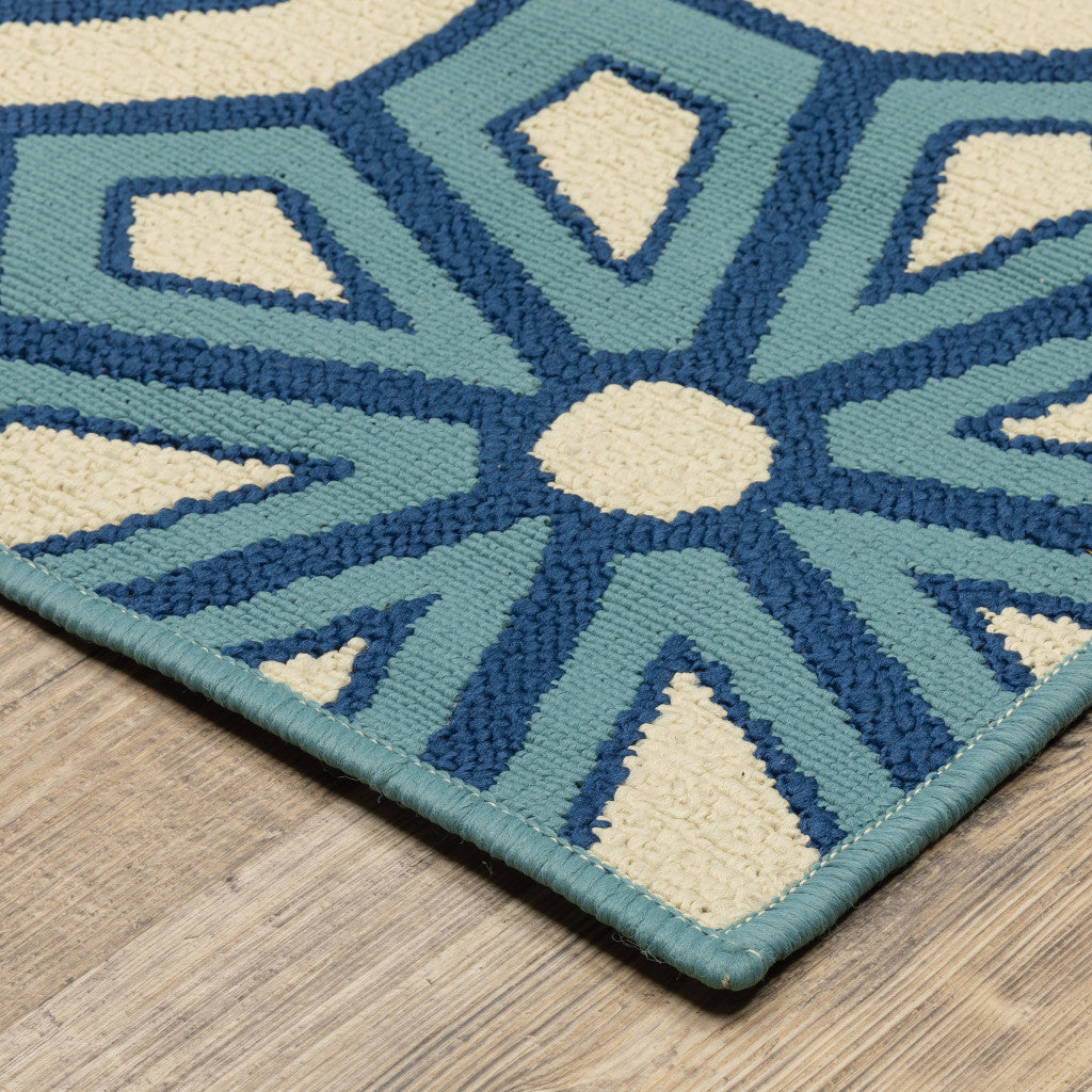 2' X 4' Ivory and Blue Geometric Stain Resistant Indoor Outdoor Area Rug