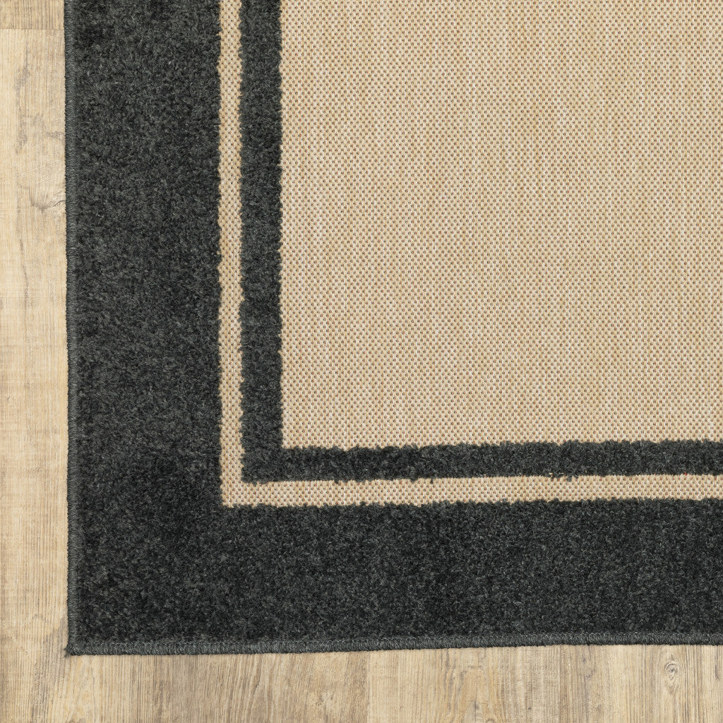 2' x 3' Beige and Black Stain Resistant Indoor Outdoor Area Rug