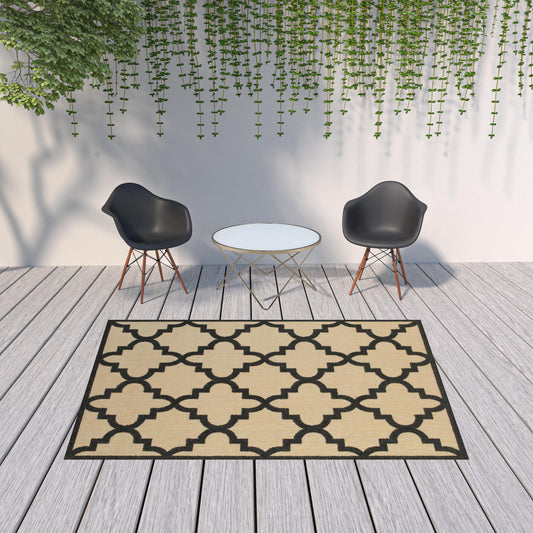 7' x 10' Beige and Black Geometric Stain Resistant Indoor Outdoor Area Rug