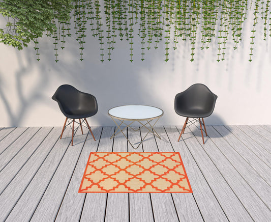 4' x 5' Orange Geometric Stain Resistant Indoor Outdoor Area Rug