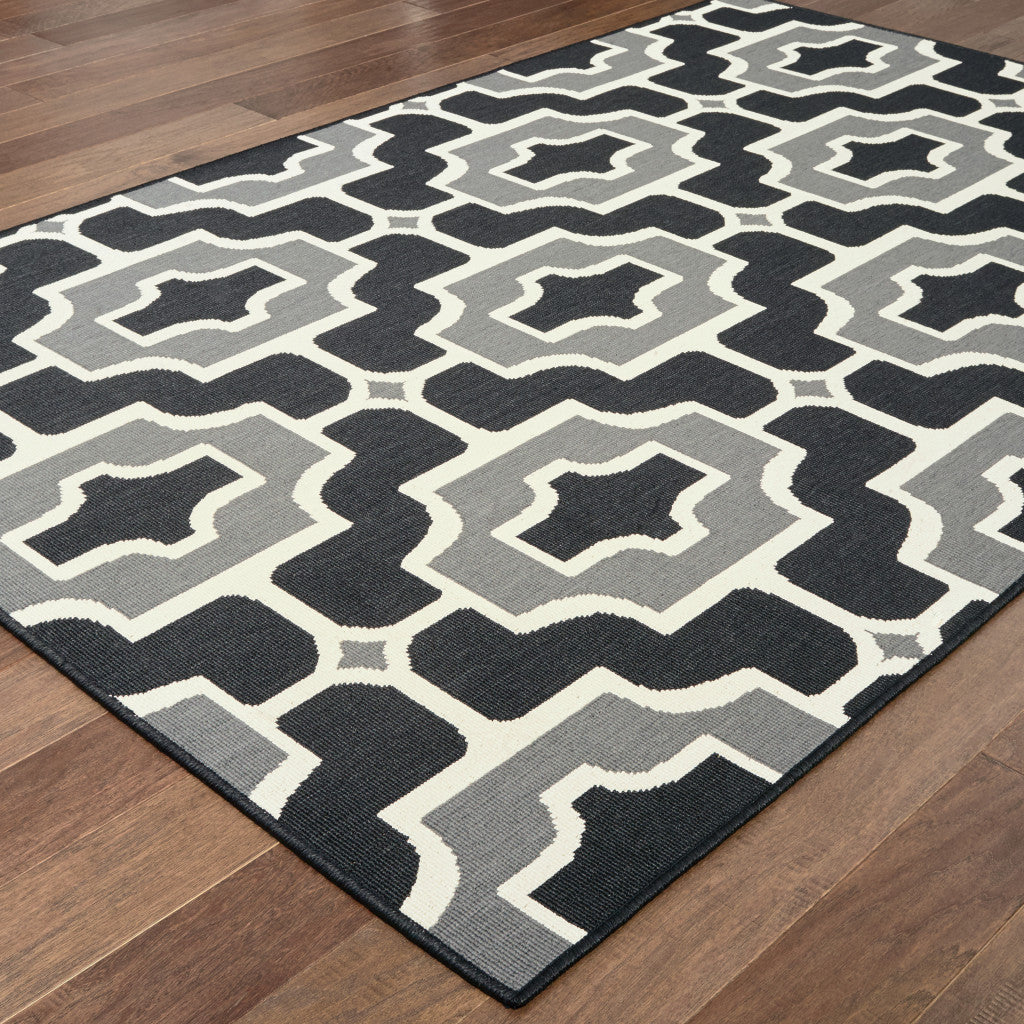 7' x 10' Black and Gray Geometric Stain Resistant Indoor Outdoor Area Rug