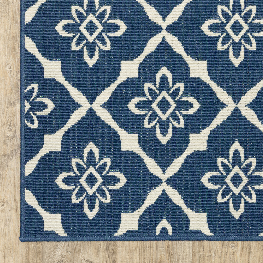 8' x 11' Blue and Ivory Floral Stain Resistant Indoor Outdoor Area Rug