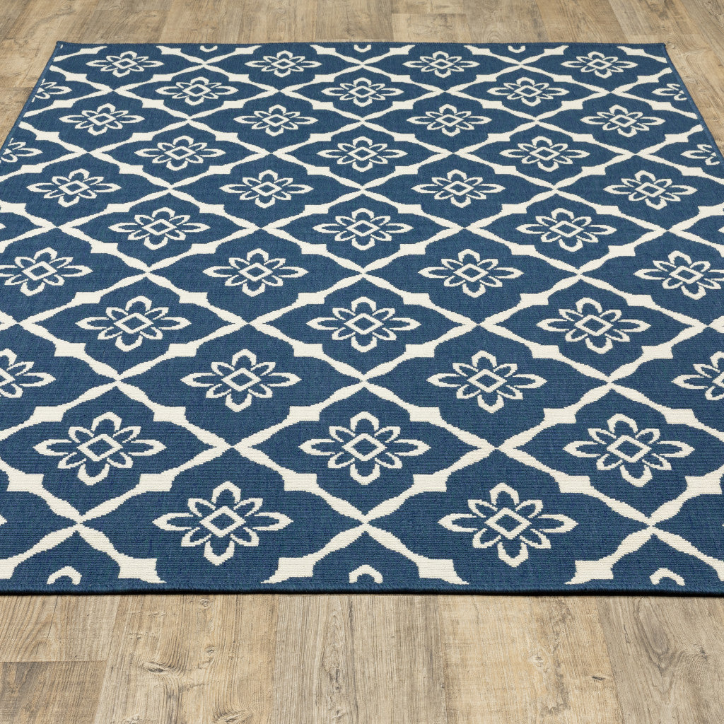 8' x 11' Blue and Ivory Floral Stain Resistant Indoor Outdoor Area Rug