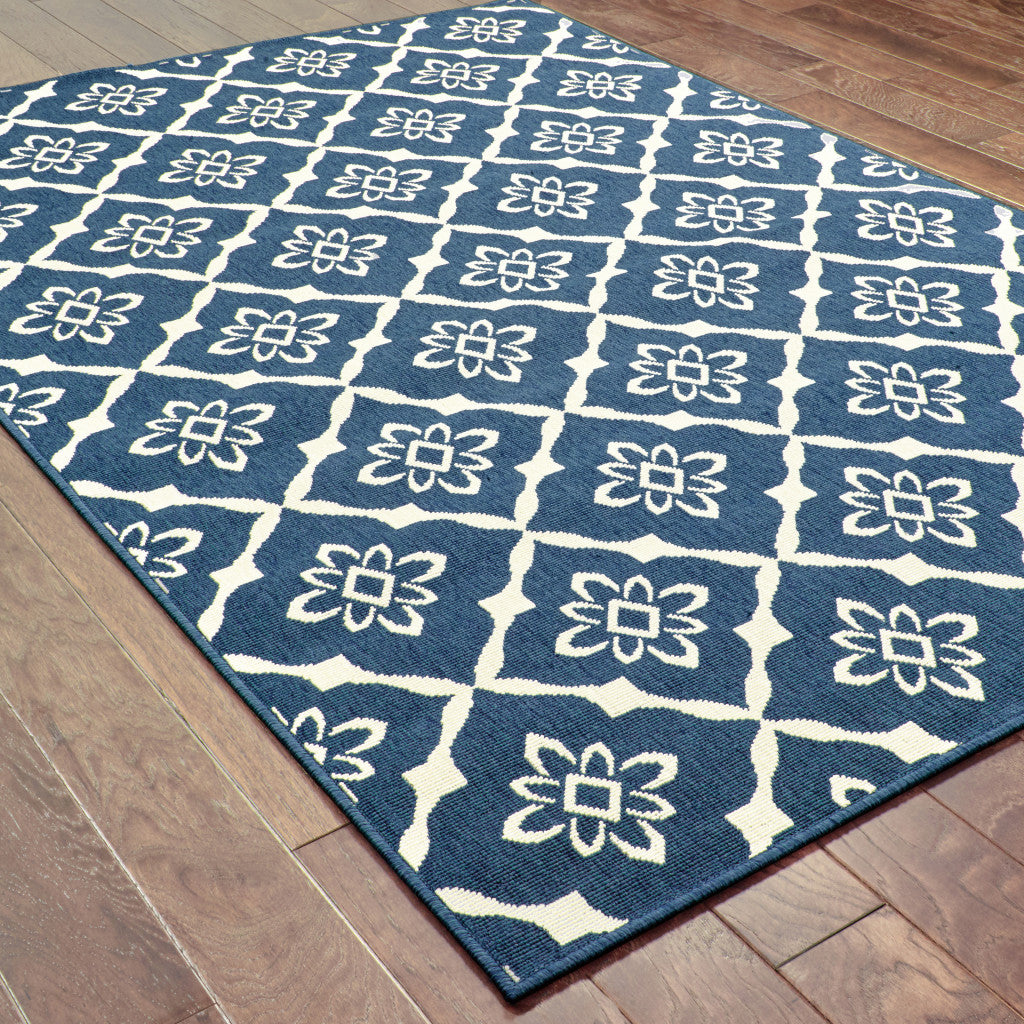 8' x 11' Blue and Ivory Floral Stain Resistant Indoor Outdoor Area Rug