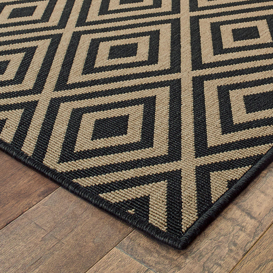 8' x 11' Black and Tan Geometric Stain Resistant Indoor Outdoor Area Rug