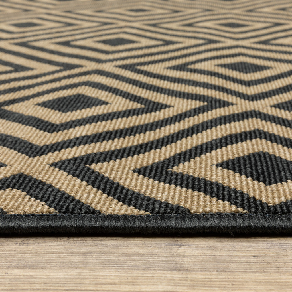 9' X 13' Black and Tan Geometric Stain Resistant Indoor Outdoor Area Rug