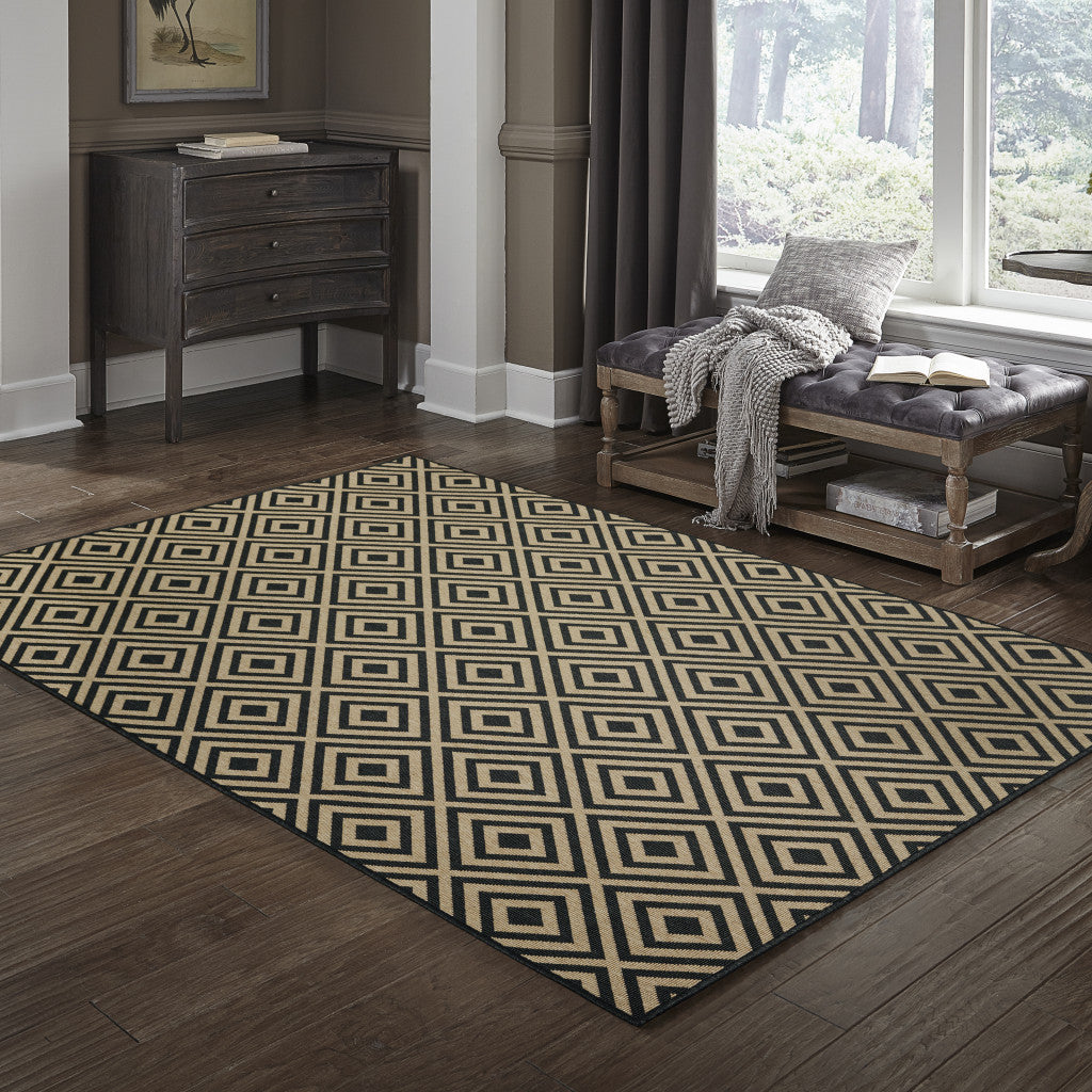 9' X 13' Black and Tan Geometric Stain Resistant Indoor Outdoor Area Rug