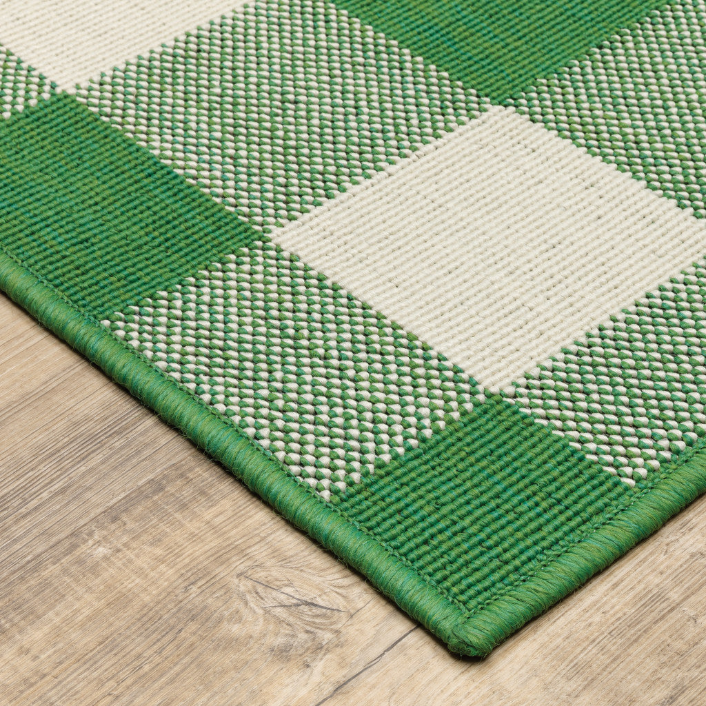 5' x 8' Green and Ivory Geometric Stain Resistant Indoor Outdoor Area Rug