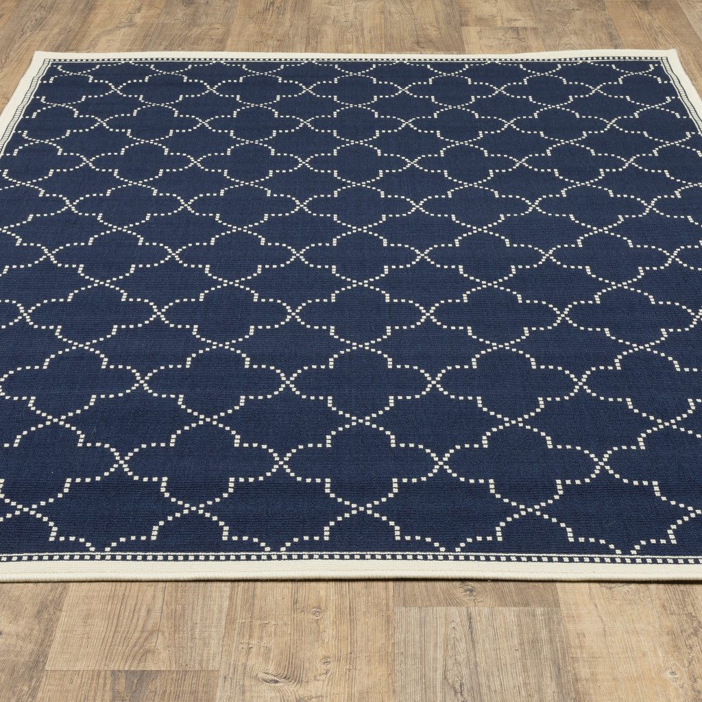 4' x 6' Blue and Ivory Geometric Stain Resistant Indoor Outdoor Area Rug