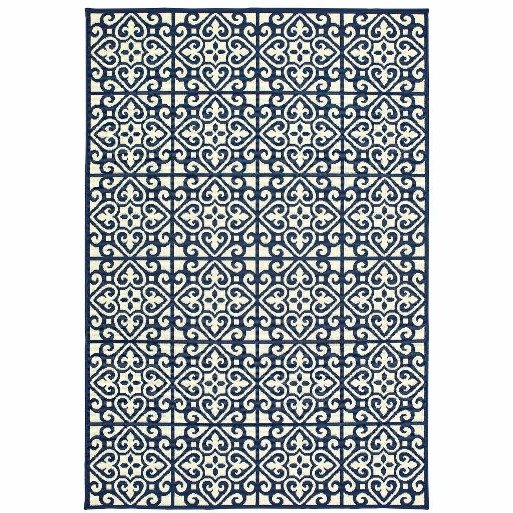 4' x 6' Ivory and Blue Geometric Stain Resistant Indoor Outdoor Area Rug