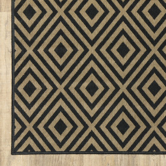 2' X 8' Black and Tan Geometric Stain Resistant Indoor Outdoor Area Rug