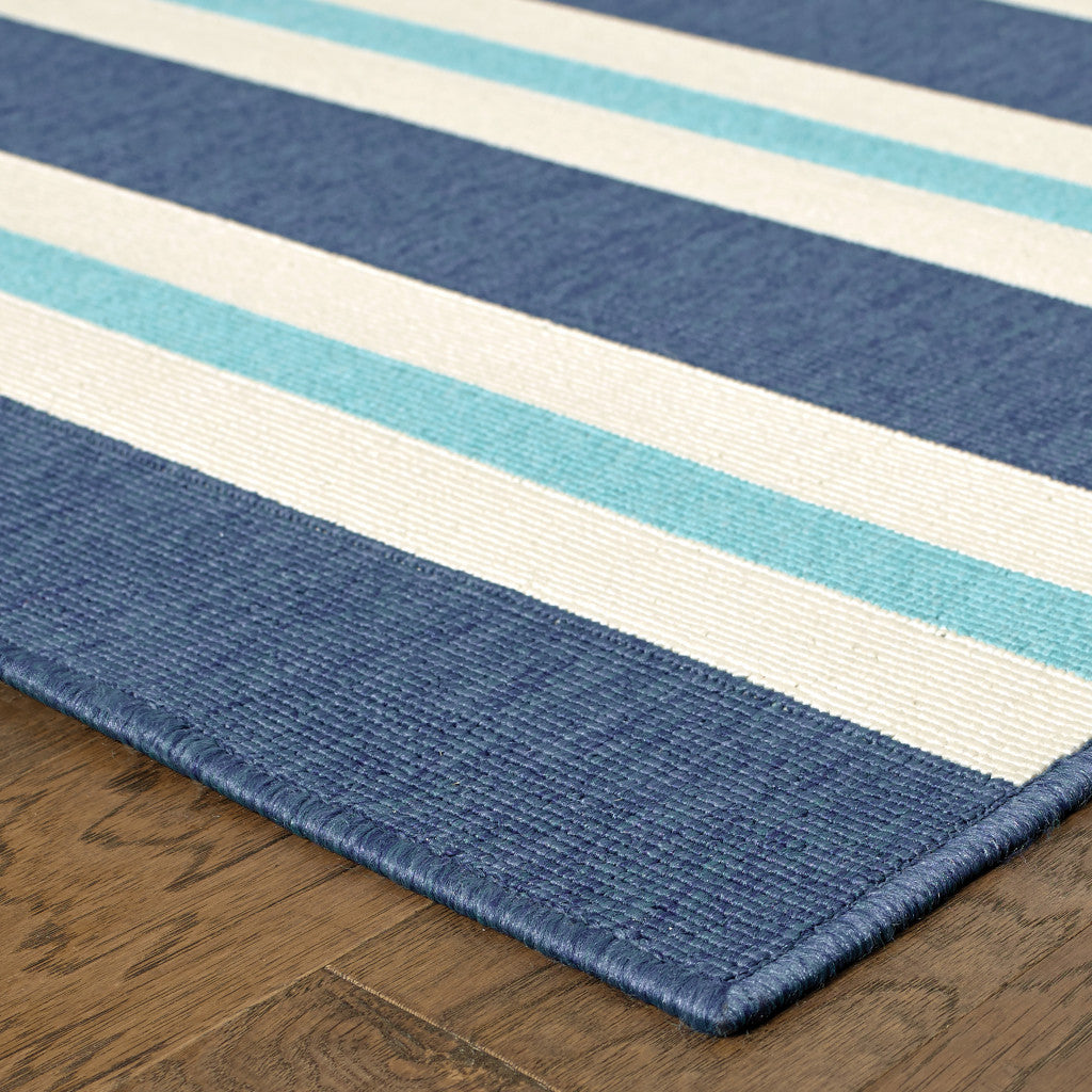 7' x 10' Blue and Ivory Geometric Stain Resistant Indoor Outdoor Area Rug